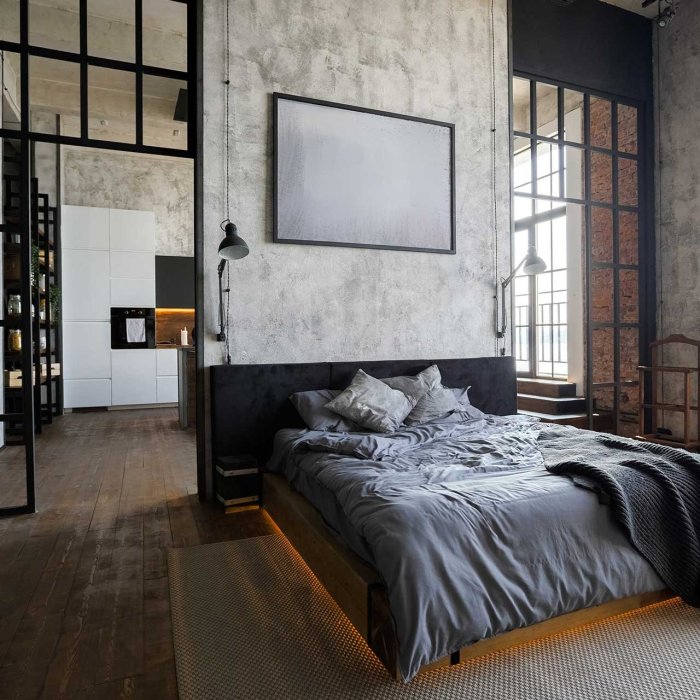 Kamar tidur industrial dengan sofa vintage